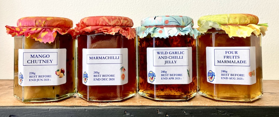 Four jars of preserves from Jacky's Pantry - Mango Chutney, Marmachilli, Wild Garlic & Chilli Jelly, and Four Fruits Marmalade